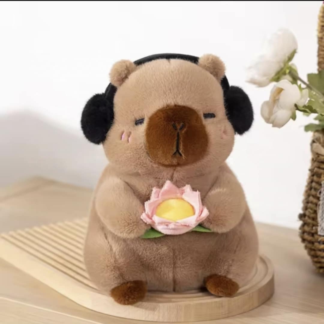 Dark Brown Capybara Holding Lotus Flower