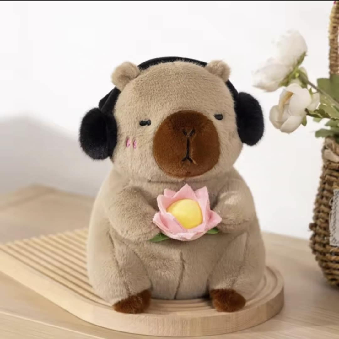 Light Brown Capybara Holding Lotus Flower